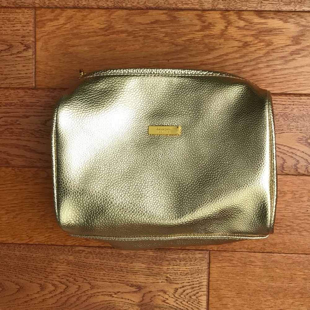cle de peau gold pebble texture cosmetic bag